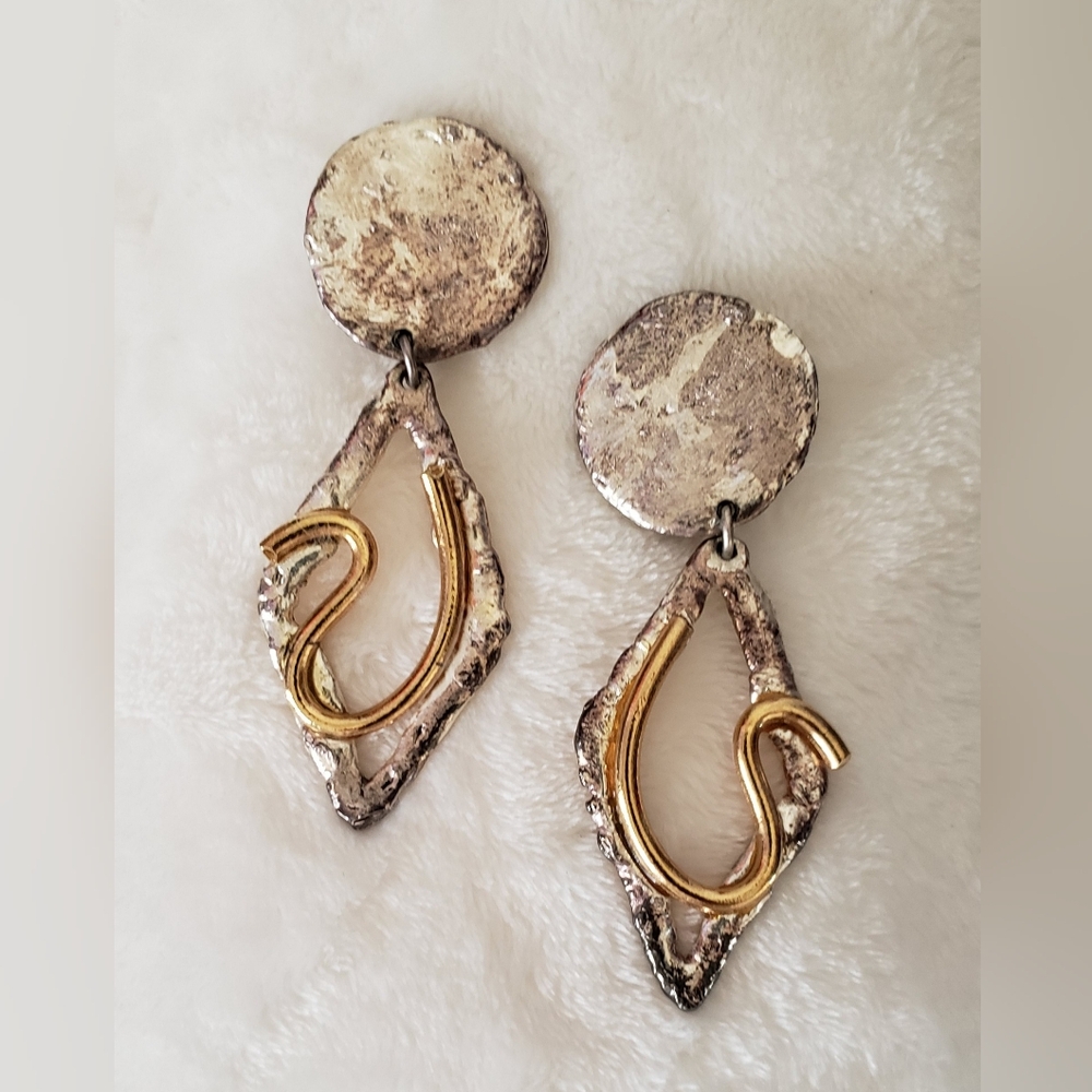 Distinctive Gold and Silver Clip-on Statement Earrings with Unique Design